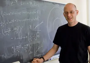 Postdoc researcher Mark Krumholz '98, shown in his office, started Princeton Project Inside.