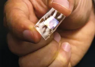 A piezoelectric crystal embedded in a silicone chip is the focus of a Project X grant.