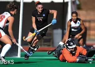 Kaitlyn Perrelle ’10, center, and goalkeeper Jennifer King ’11 led Princeton’s defense against Maryland.