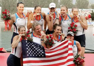 LIVE.SP_Lind.jpg Caroline Lind '06, standing second from right, celebrates with members of the U.S. women’s eight after the team won the gold medal at the Beijing Olympics Aug. 17.