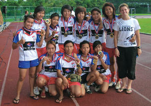Volunteer coach Elena Olivi ’07, right, with the Vientiane Lions.