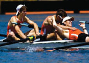 From left, Christian Klein ’11, James Donovan ’10, and Tom Paulett ’09 celebrate a national title.
