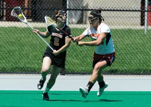 LIVE.SP_wlax_3.jpg Maisie Devine ’11 and the Tigers fell to No. 1 Maryland after knocking off No. 8 James Madison.