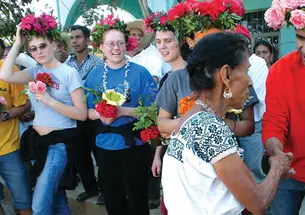 Above, Cruz Blanca Initiative volunteers receive a traditional welcome in a rural Mexican community where they were building a water well. From left: Alexandra Connell ’07, Jevon Harding ’06, Owen Fletcher ’08, a community elder, and Kush Parmar ’