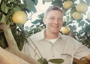 Richard Shallberg ’54 in his citrus grove in Florida