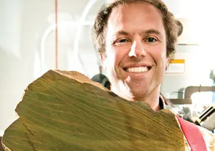 LOM-Maloof-DSC1106v4.jpg Adam Maloof prepares to grind a rock that records tidal cycles 640 million years ago.