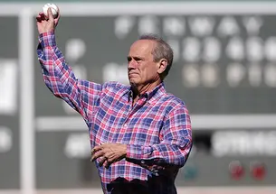 Larry Lucchino ’67 throws the ceremonial first pitch at a Red Sox-Orioles game in 2015.
