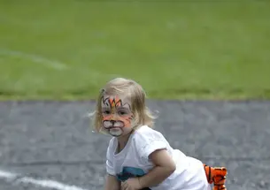 Sophia Cardona-Fox, great-granddaughter of the late Fred E. Fox '39, enjoys a Reunions visit to Cannon Green. 