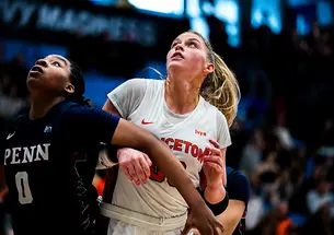 Ellie Mitchell ’24, right, battles for rebounding position with Penn’s Jordan Obi.