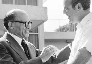 Samuel W. Lewis *64, right, with soon-to-be Israeli prime minister Menachem Begin.