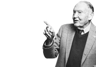 A black and white Image of John Bogle class of 51 pointing. 