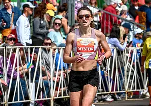 Maddie Offstein runs in a race.