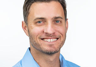 This is a headshot photo of Mark Herrema ’04