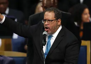 Michael Eric Dyson *93 speaks during the funeral service for Aretha Franklin at Greater Grace Temple in Detroit in 2018.
