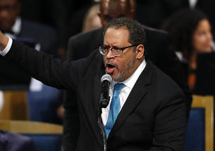 Michael Eric Dyson *93  speaks during the funeral service for Aretha Franklin at Greater Grace Temple in Detroit in 2018.