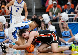 Creighton's Trey Alexander and Princeton's Ryan Langborg ’23 vie for a loose ball in the second half of Friday's Sweet 16 game.
