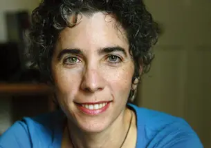 A smiling woman's portrait. 