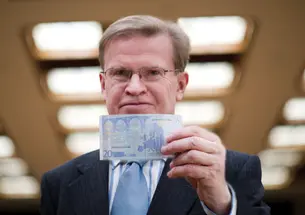 A new book by ­Professor Harold James, shown holding a 20-euro note, finds “a crucial flaw” in the creation of the European Monetary Union.