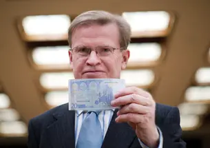 A new book by ­Professor Harold James, shown holding a 20-euro note, finds “a crucial flaw” in the creation of the European Monetary Union.