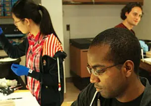 First-year molecular biology grad students Matt Howard, front; Wenyang Li; and Whitby Eagle during the summer MOL500 course.