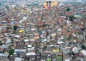 A view of Complexo do Alemão, a shanty town in northern Rio de Janeiro, from a tram used by residents and tourists. Hank Song '11, left, visited some of Brazil’s poorest ­neighborhoods as a Princeton in Latin America fellow last year.