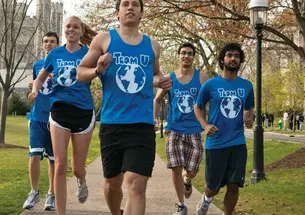 Joe Benun ’15, center, trains with members of Team U before a half-marathon April 22 to benefit Shoe4Africa.
