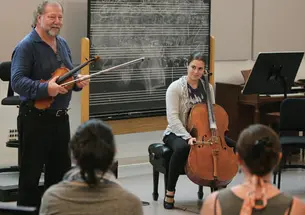 Fiddler Alasdair Fraser and cellist Natalie Haas discuss Scottish folk music with “Making Tunes!” students.