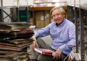 Professor Sean Wilentz, author of a new book on Columbia Records, with a stack of albums at the Record Exchange in Princeton.