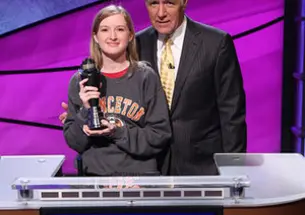 Terry OâShea '16, pictured with Alex Trebek, is a lifelong Jeopardy! fan. (Photo: Courtesy Jeopardy! Productions Inc.)
