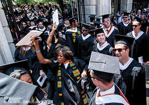 The Class of ’14 exits jubilantly through FitzRandolph Gate at the conclusion of Commencement.