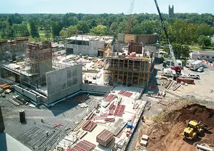 Concrete and steel have been rising for the three buildings on Alexander Street that will provide academic, rehearsal, and performance spaces for the music department, at left, and for the Lewis Center for the Arts.