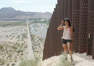 Yessica Martinez ’15 along the U.S.-Mexico border last summer on a research trip for her thesis.