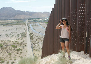 Yessica Martinez ’15 along the U.S.-Mexico border last summer on a research trip for her thesis.