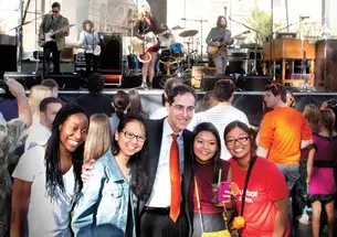 President Eisgruber ’83 poses with students during the concert that followed his installation.