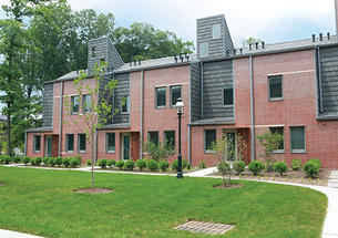 Lakeside’s townhouses feature brick and tile exteriors and landscaping.