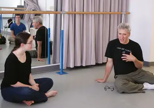 Tim Vasen, director of the Program in Theater, leads a workshop on theater directing.
