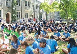 Following Opening Exercises and the Pre-rade, freshmen gathered for a barbecue on Alexander Beach.