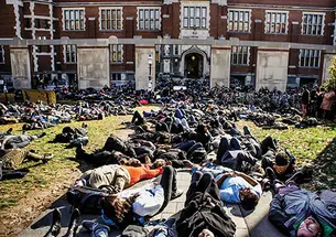 Students blocked the paths outside Frist Campus Center Dec. 4 in a 45-minute “die-in” to protest racial injustice.