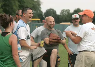 Professor Alain Kornhauser *71, far right, is Mr. Summer Softball. He says that alumni stop him in airports to chat about the league, years after they’ve left Princeton.