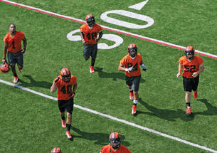 This year’s football team (pictured at the first practice of the season) has a promising roster of returning players.