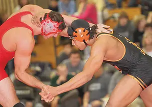 Abram Ayala ’16, right, won 23 matches this season for the resurgent Tigers.