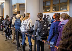 Students line up in Frist Campus Center to receive the meningitis B vaccine.