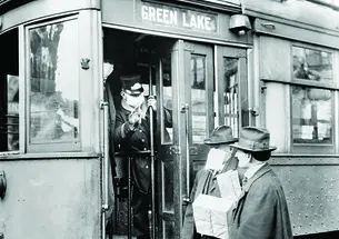 OTC_1918 Spanish Flu Seattle.jpg Face masks on public transit in Seattle, Washington.