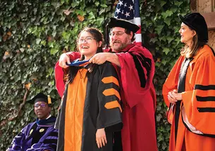 Student earning hood