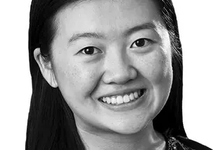 This is a black-and-white headshot photo of Allison Tang.