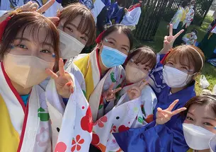 Anne Wen ’23, at center in blue mask, attends a traditional Japanese festival in Osaka, Japan