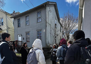 Fern Spruill, center, leads students on a walking tour