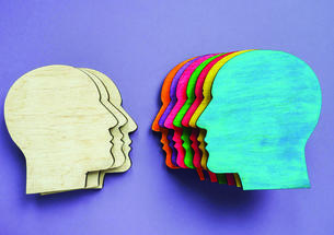 Graphic illustrating diversity using differently colored heads