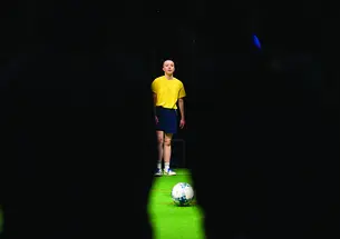 A classmate performs a scene from December’s Play. 