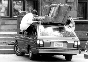 October FTA.jpg Students removing couch from the roof of a car